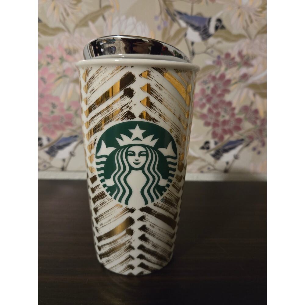2015 Starbucks gold chevron travel mug. Lid is silver